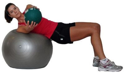 Spine Workout women 4 - Medicine Ball Rotations