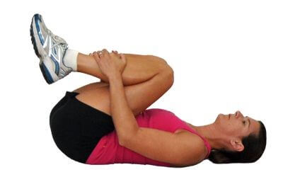 Spine Workout women 8 - Knees to Chest