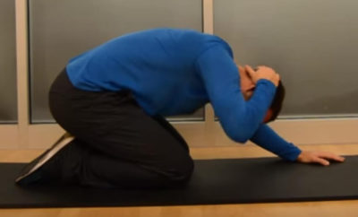 Warm up back - Rock-Back Rotation Step 1