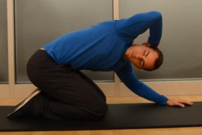 Warm up back - Rock-Back Rotation Step 2